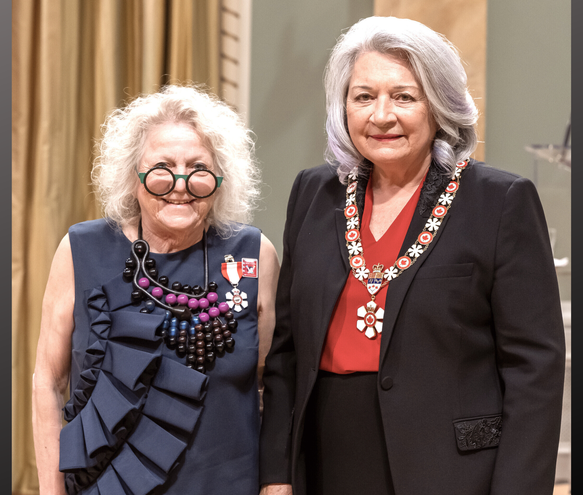 Photograph of Margie Wolfe standing next to Governor General Mary Simon during the medal ceremony in Rideau Hall in Ottawa.